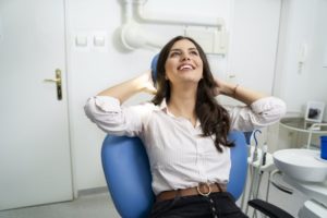 Woman smiling after visiting the cosmetic dentist in Weatherford